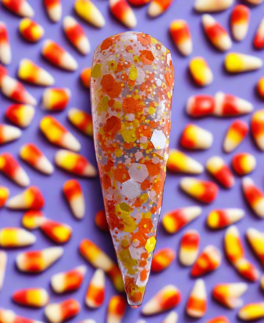 Acrylic Powder-Haunted Hayride nail design with colorful, glittery Halloween-themed accents.