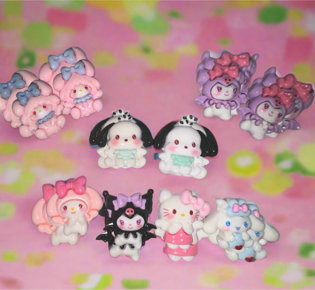 Hello Kitty nail charms set featuring Hello Kitty, Kuromi, and Melody characters, 10 pieces, 25x27mm.