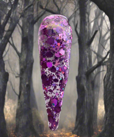 Acrylic Powder-Haunted Hayride with glitter in a spooky forest background.