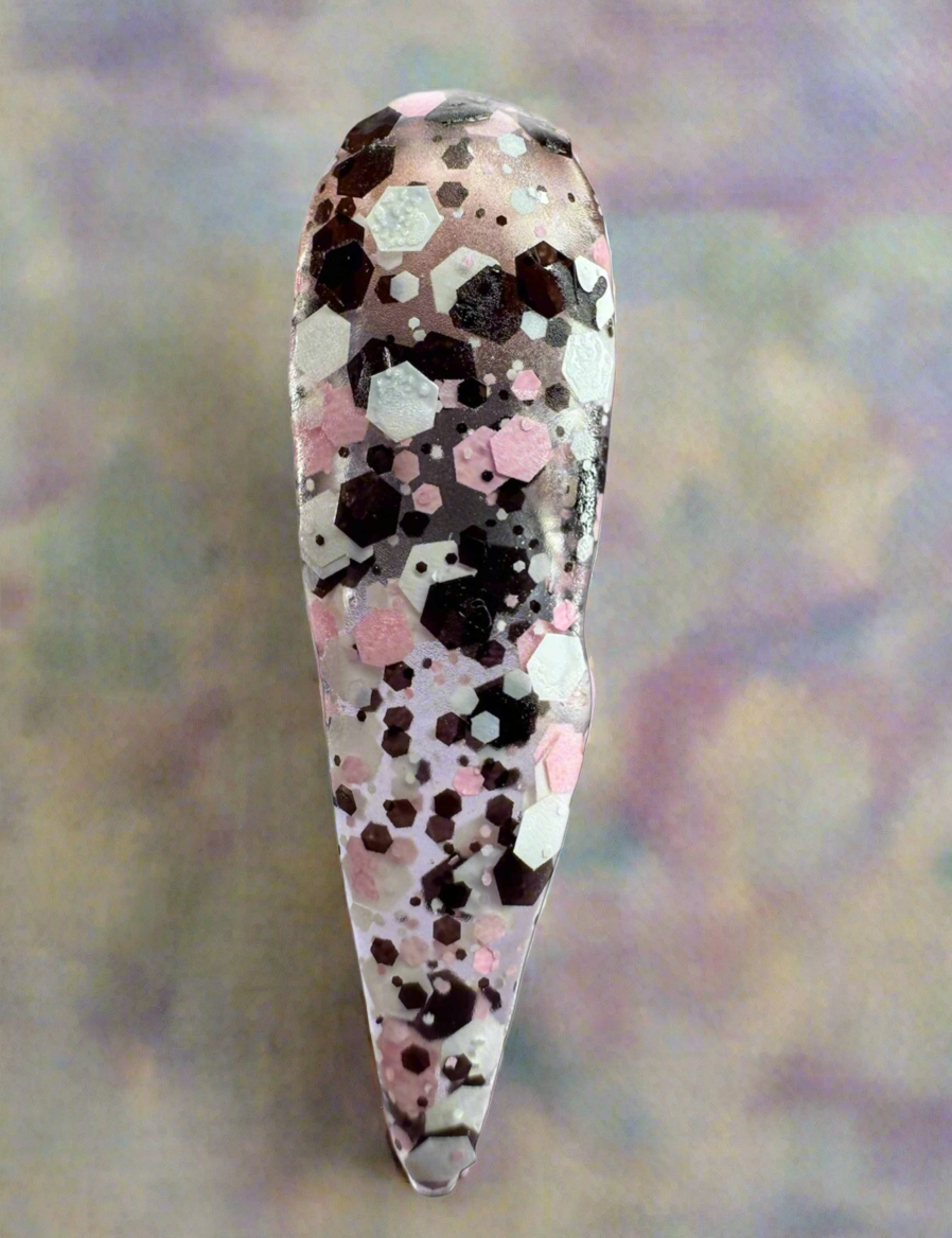 Halloween-themed acrylic powder nail design, glitter, spooky style.