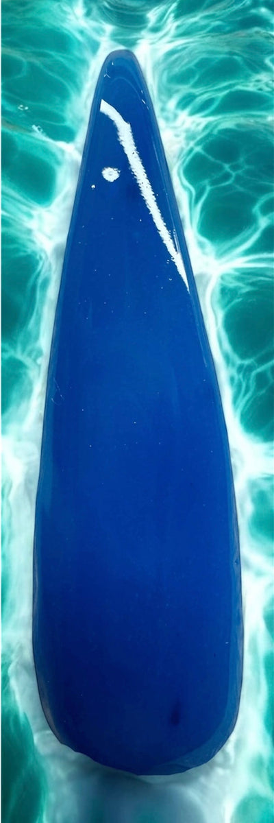 Neon Nail acrylics - Pool Party Collection, shiny blue nail in water.