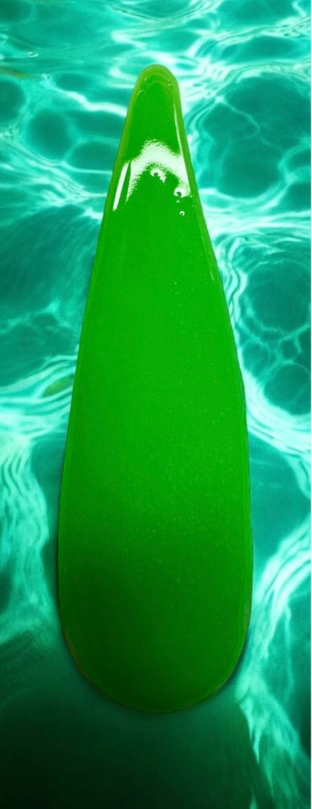 Neon green nail acrylic with a glossy finish from the Pool Party Collection.