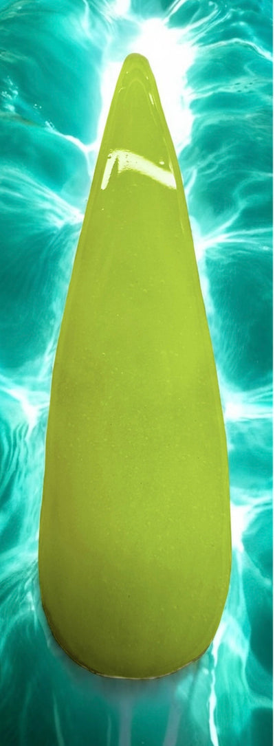 Neon Nail acrylics - Pool Party Collection vibrant green shade against a pool background.