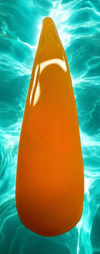 Neon Nail acrylics - Pool Party Collection with bright orange shade against water background.