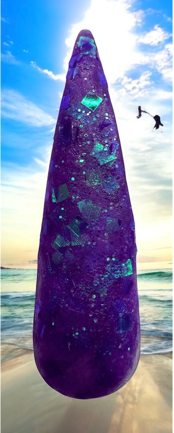 Neon Nail acrylics - Pool Party Collection; vibrant purple nail acrylic with glitter accents.