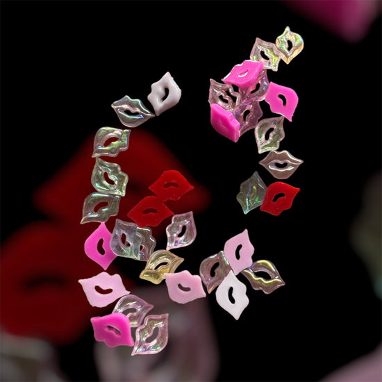 Lips charms small 20 piece set for nail art, colorful designs on black background.