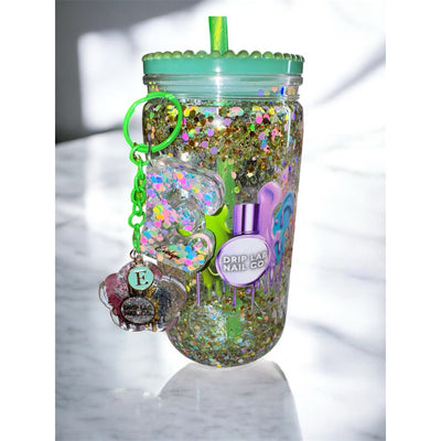 Drip Lab Branded Hot Girl Tumbler with glitter, rhinestone lid, green straw, and personalized keychain.