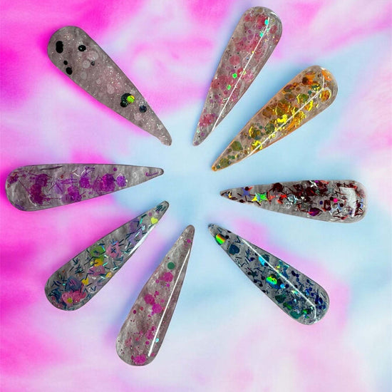 Nail Builder Glitter Gel Collection with vibrant colors and custom glitter designs.